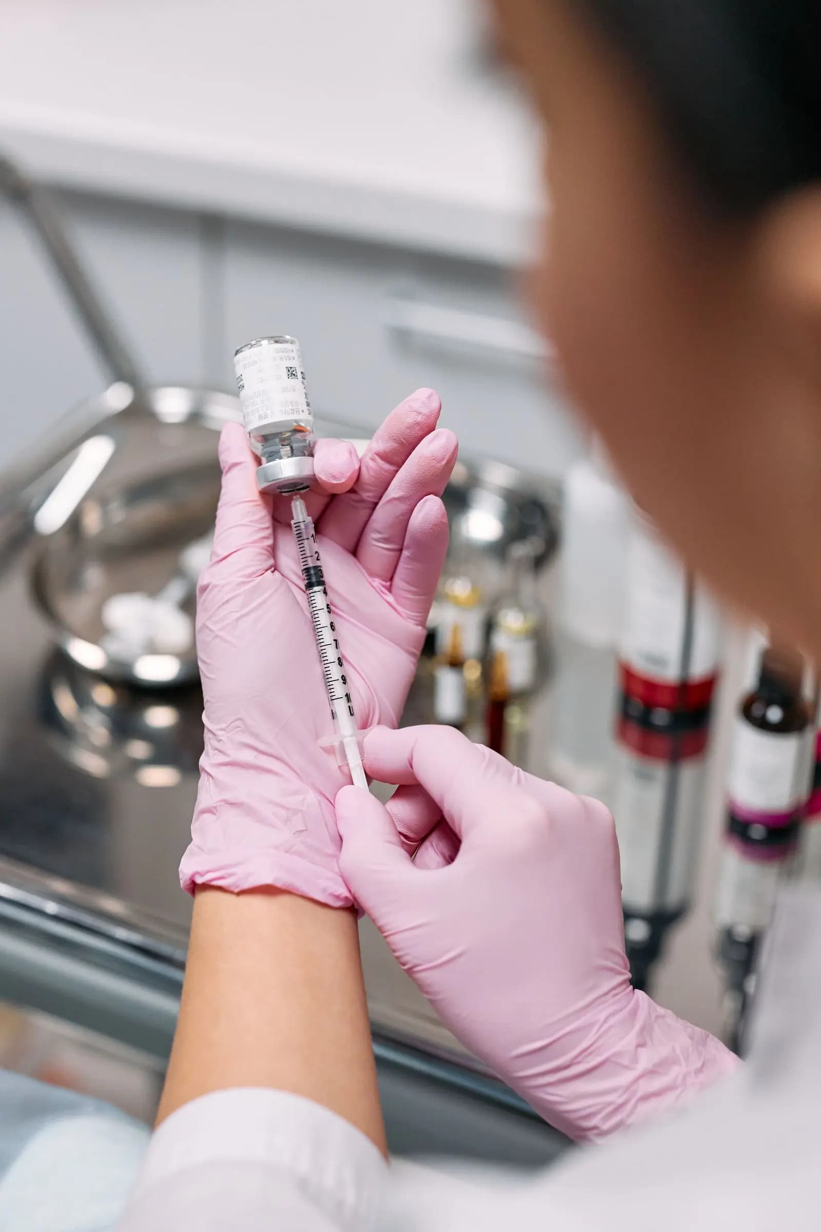 Preparing a syringe with sterile technique