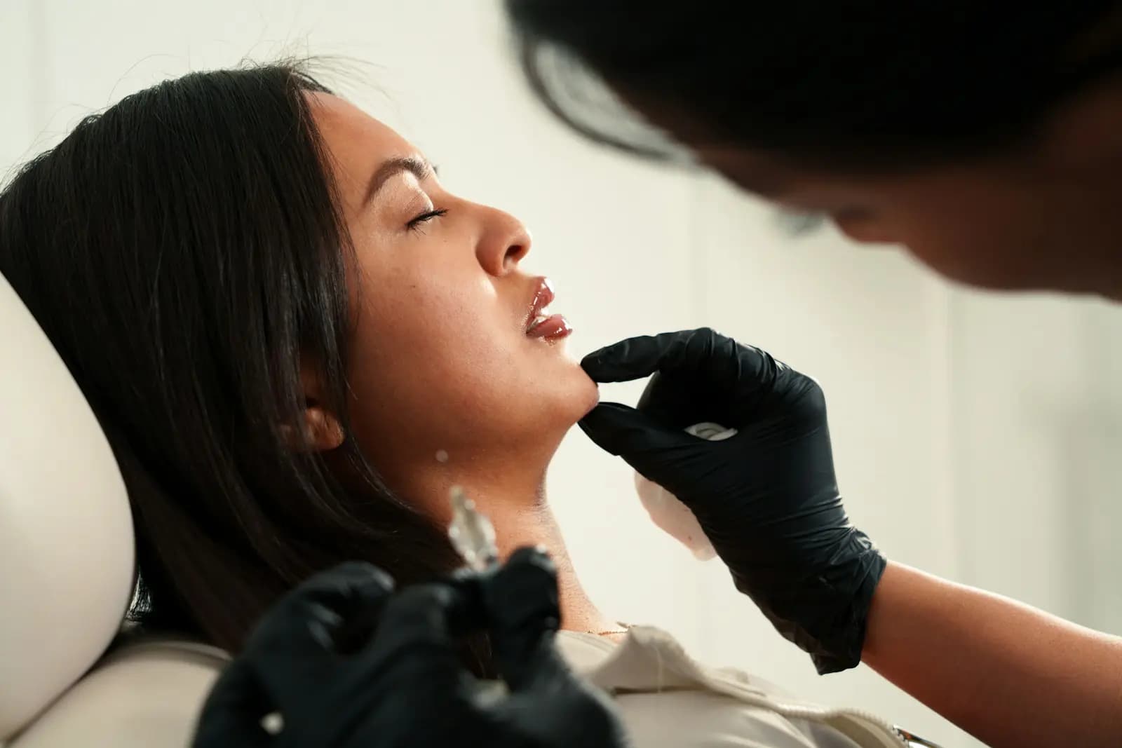Injection under the chin to treat fullness